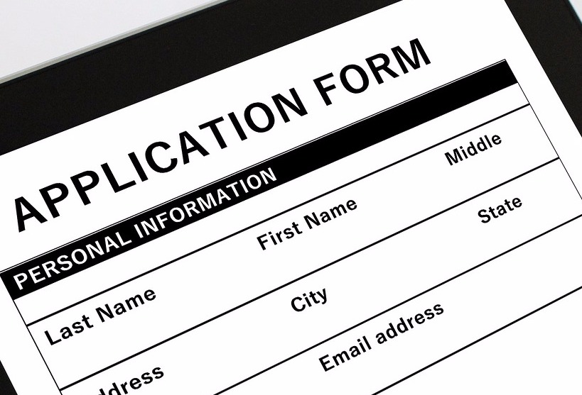 Federal investigator codnucting a security clearance background investigation interview